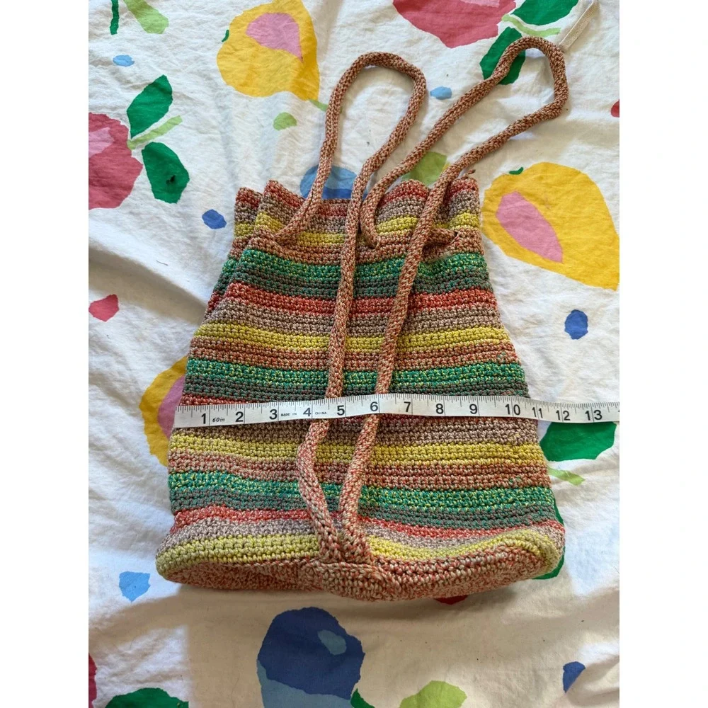 The Sak Crochet Drawstring Backpack Multi Color Striped Boho Bag Handcrafted